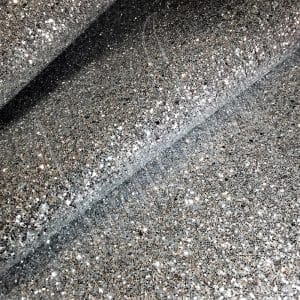 The Chunky Glitter fabric collection is ideal for adding a touch of sparkle to your projects such as shoes, handbags, hats, bows, garments, belts, and accessories. The material is made of Glitter Fabric PET in round and hexagon shapes with a polyester twill fabric backing. It has a width of 54 inches with a tolerance of ± 0.5" and a thickness of 1.3mm (0.05"). The country of origin is China.