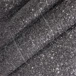 The Chunky Glitter fabric collection is ideal for adding a touch of sparkle to your projects such as shoes, handbags, hats, bows, garments, belts, and accessories. The material is made of Glitter Fabric PET in round and hexagon shapes with a polyester twill fabric backing. It has a width of 54 inches with a tolerance of ± 0.5" and a thickness of 1.3mm (0.05"). The country of origin is China.