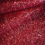 The Chunky Glitter fabric collection is ideal for adding a touch of sparkle to your projects such as shoes, handbags, hats, bows, garments, belts, and accessories. The material is made of Glitter Fabric PET in round and hexagon shapes with a polyester twill fabric backing. It has a width of 54 inches with a tolerance of ± 0.5" and a thickness of 1.3mm (0.05"). The country of origin is China.