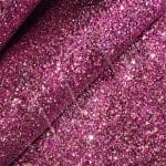 The Chunky Hologram Glitter fabric collection is made of Glitter Fabric PET in round and hexagon shapes with a polyester twill fabric backing. It is 54 inches wide with a tolerance of ± 0.5″ and has a thickness of 1.3mm (0.05″). This collection can be used for shoes, handbags, hats, bows, garments, belts, and accessories.