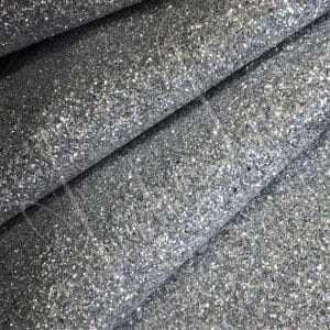 The Chunky Hologram Glitter fabric collection is made of Glitter Fabric PET in round and hexagon shapes with a polyester twill fabric backing. It is 54 inches wide with a tolerance of ± 0.5″ and has a thickness of 1.3mm (0.05″). This collection can be used for shoes, handbags, hats, bows, garments, belts, and accessories.