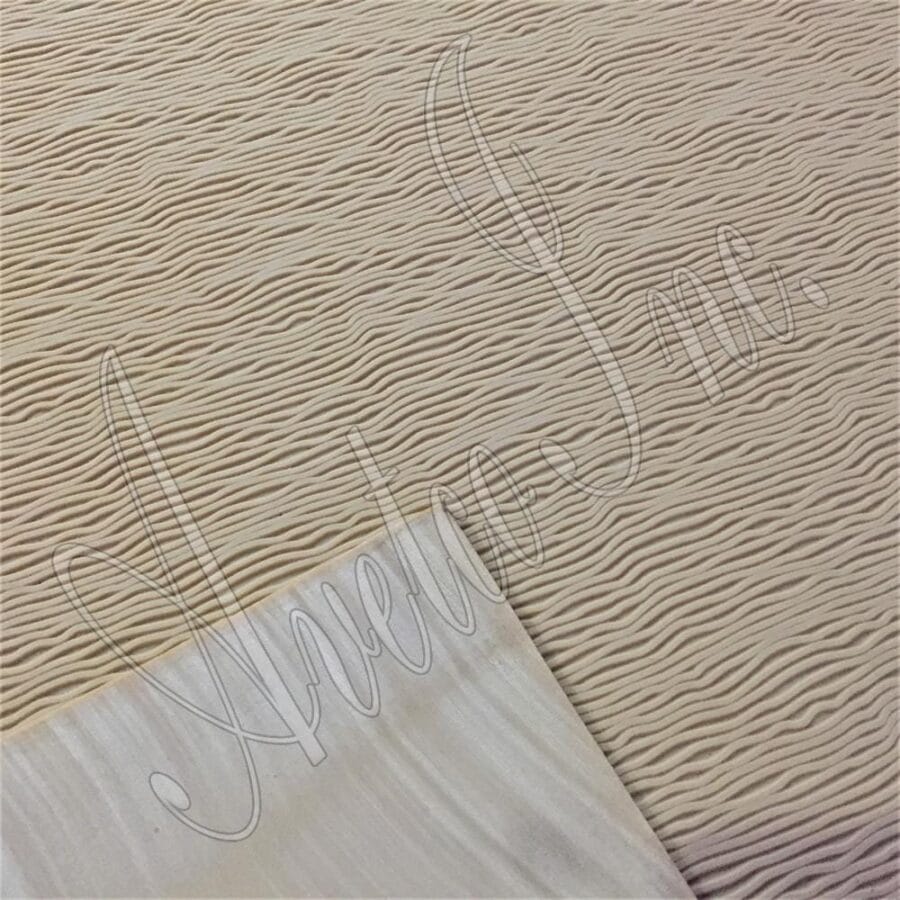 Close-up of wave tread design on natural gum rubber soling sheet for shoes