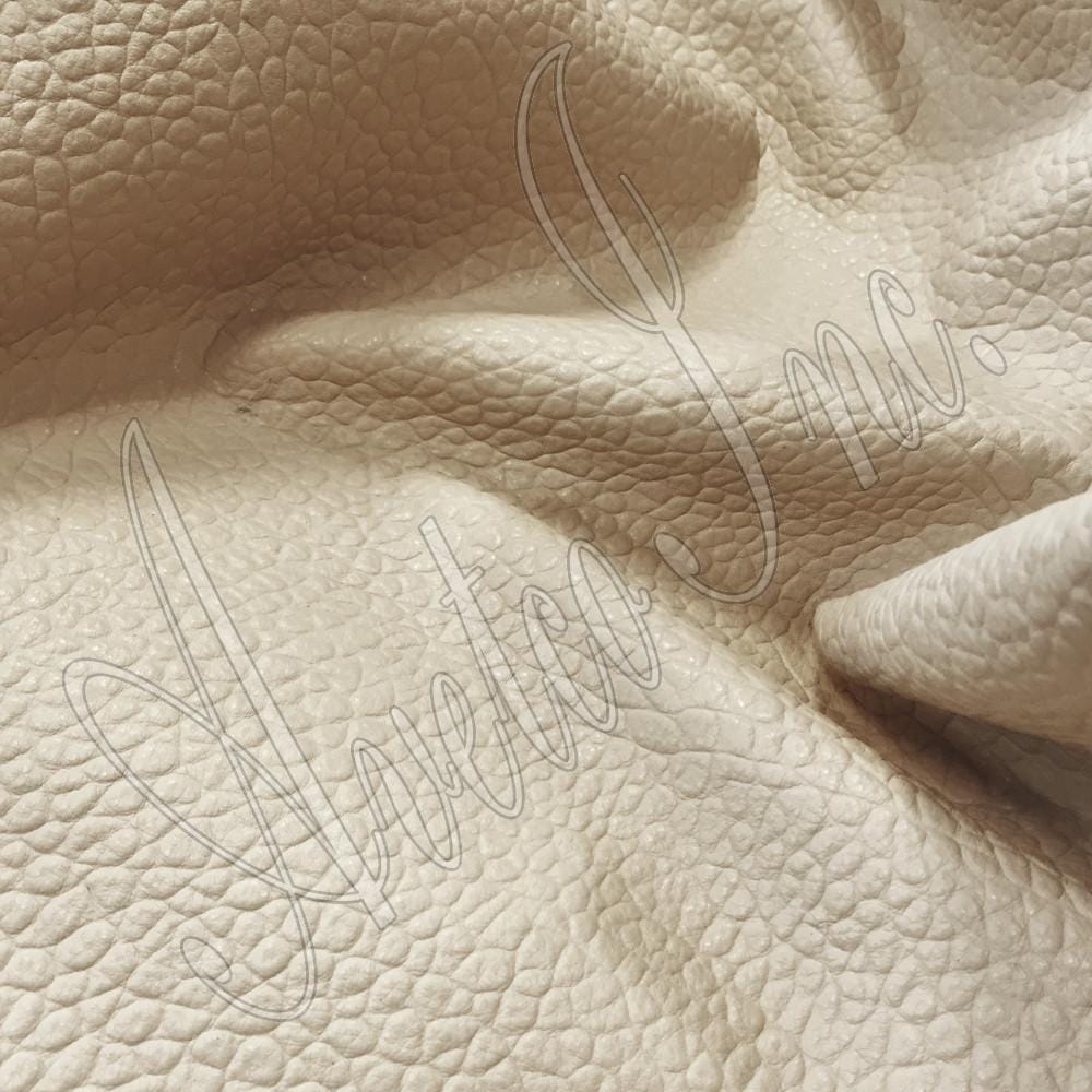 Tango Embossed Cow Leather Sand Avetco Inc.