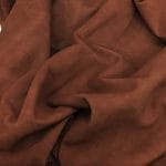 goat suede sL-1002 Rustic Brown | Avetco Leather Hides and Eva Foam Goatskin Garment Suede Leather 5-7 square feet hide Leather 1.5oz thick soft and easy to use Suitable for shoes footwear handbags garments shirts jackets vests What is Goat Suede? Goat suede undergoes an extra finishing process that creates a velvety texture. This process involves buffing the flesh side of the hide, resulting in a soft and textured nap that feels wonderful to the touch.