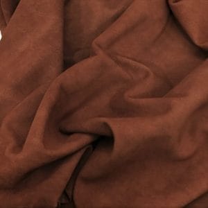 Goatskin Garment Suede Leather 5-7 square feet hide Leather 1.5oz thick soft and easy to use Suitable for shoes footwear handbags garments shirts jackets vests What is Goat Suede? Goat suede undergoes an extra finishing process that creates a velvety texture. This process involves buffing the flesh side of the hide, resulting in a soft and textured nap that feels wonderful to the touch.