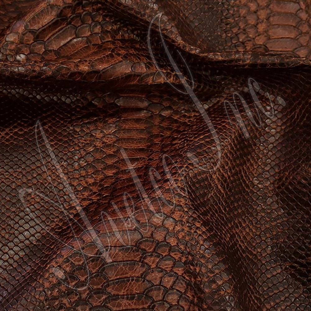 Snake Embossed Cow Leather Cognac Avetco Inc