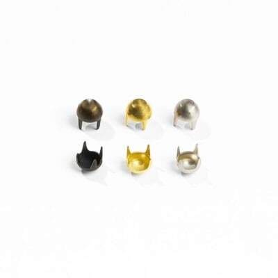 6.5mm cone nailheads a59 shown from top and bottom views, with four prongs for secure attachment to leather or fabric.