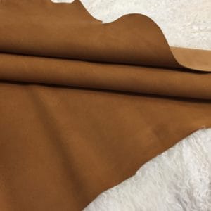 Our Kidskin Suede Leather collection features a beautiful, ultra-soft suede material that creates a chic, timeless look for any style. The collection includes a curated selection of neutral tones, offering classic shades that blend seamlessly into any wardrobe. The luxurious suede material has a supple feel that is irresistible to the touch, perfect for those seeking elegance in understated colors.