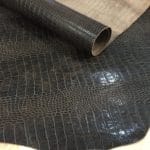 The Alligator leather is a highly attractive and unique type of leather that boasts an exotic style and color tone that is truly mesmerizing. It is a corrected grain leather that is sourced from Europe and has been specially embossed to reproduce the pattern of alligator skin, which gives it a very prominent appearance. The leather's deep texture and rich tone variation are completed by a stucco-finish on the surface, which gives it a smooth surface with a subtle shine.