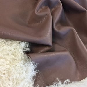 The Cobalt Cow Leather is a European, pigmented grain whole hide with a rich, pebble-granulated texture. This piece offers exceptional softness and true comfort to the touch. The consistent pattern and color make an exquisite and durable leather option. The unbuffed surface gives the material a matte appearance with a subtle shine adding character to the otherwise subtle look. Aside from being tastefully bare, the Cobalt collection is skillfully prepared to provide excellent cutting yields.