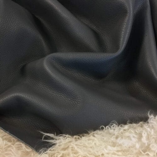 Cobalt cow leather with pigmented pebble grain texture. High-quality cobalt cow leather side hide for handbags, footwear , upholstery and crafting use.- Avetco