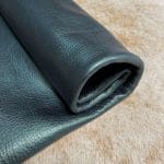 The Hudson Metallic Collection - a unique style that boasts a distressed look and pearlized finish. The leather has a smooth and silky surface, showcasing an array of vibrant colors that shimmer in the light. This collection features natural drum-dyed leather that is full grain and made from full-hide cowhide. With an average hide size of 18-20 square feet, the leather is 3 ounces thick (1.0 - 1.2mm) with a pearlized natural grain texture. The temper is medium-soft, and the tannage is chrome-tanned.