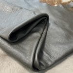 The Hudson Metallic Collection - a unique style that boasts a distressed look and pearlized finish. The leather has a smooth and silky surface, showcasing an array of vibrant colors that shimmer in the light. This collection features natural drum-dyed leather that is full grain and made from full-hide cowhide. With an average hide size of 18-20 square feet, the leather is 3 ounces thick (1.0 - 1.2mm) with a pearlized natural grain texture. The temper is medium-soft, and the tannage is chrome-tanned.