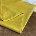 The Hudson Metallic Collection - a unique style that boasts a distressed look and pearlized finish. The leather has a smooth and silky surface, showcasing an array of vibrant colors that shimmer in the light. This collection features natural drum-dyed leather that is full grain and made from full-hide cowhide. With an average hide size of 18-20 square feet, the leather is 3 ounces thick (1.0 - 1.2mm) with a pearlized natural grain texture. The temper is medium-soft, and the tannage is chrome-tanned.