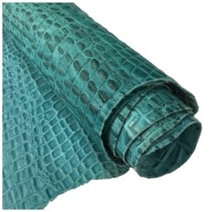 Oltu crocodile embossed cow leather hide in turquoise color. Avetco