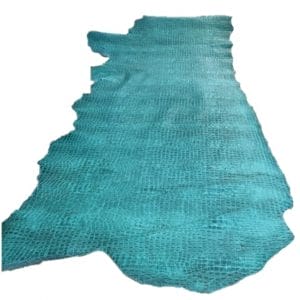 Oltu crocodile embossed cow leather hide in turquoise color. Avetco