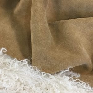 what is cow suede leather? The Vertu Cow Suede Leather Collection is made with exquisite cowhide and suede leather, with a thickness of 1.2-1.6mm and a weight of 3/4 oz. hide size 10-14 sq. ft. Chrome tanning techniques are used for a timeless and classic material, perfect for high-end jackets, boots,belts, and other leather items.