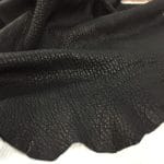 Black Lambskin Avetcoinc@ | Avetco Leather Hides and Eva Foam Bubble-shrunken Lambskin is a unique type of soft and cushiony lambskin with a shrunken bubble grain texture that gives it an intriguing and dynamic appearance. Each piece is one-of-a-kind due to the variation in the shrunken effect from one skin to another. The leather is semi-aniline dyed, making it rich and luxurious. It is also durable and flexible, with a thickness of 1.2-1.4 mm. Additionally, it is free from harmful chemicals, making it safe for use and environmentally friendly. If you're looking for high-quality and sustainable leather for apparel, accessories, handbags, or small leather goods, the Bubble Sheep collection is an excellent choice.