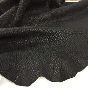 Bubble-shrunken Lambskin is a unique type of soft and cushiony lambskin with a shrunken bubble grain texture that gives it an intriguing and dynamic appearance. Each piece is one-of-a-kind due to the variation in the shrunken effect from one skin to another. The leather is semi-aniline dyed, making it rich and luxurious. It is also durable and flexible, with a thickness of 1.2-1.4 mm. Additionally, it is free from harmful chemicals, making it safe for use and environmentally friendly. If you're looking for high-quality and sustainable leather for apparel, accessories, handbags, or small leather goods, the Bubble Sheep collection is an excellent choice.