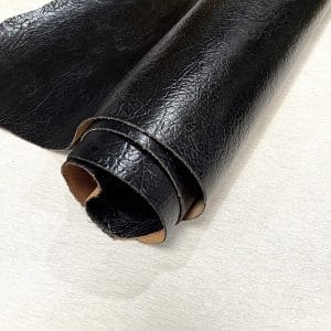 Crafted from premium cowhide, this double shoulder leather features an intricate elephant embossing pattern that adds a bold, exotic texture to any project