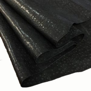 Ostrich Embossed Cow Leather is made of European leather with a unique embossed grain texture that resembles Ostrich skin. Its rough appearance, complete with grooves and bumps, makes it beautiful and durable. The leather has a waxed finish that adds smoothness and shine to its surface. This collection uses chrome tanning, which gives it a luxurious and rich look.