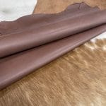 Buffalo Lining Root Beer 4 | Avetco Leather Hides and Eva Foam Buffalo lining leather is known for its strength, unique texture, and durability. Tanned with chrome for added toughness and water resistance, this leather is excellent for lining footwear, bags, apparel, and furniture. With an average hide size of 14-16 sq. ft., it's a preferred choice for crafting durable and visually distinct products.