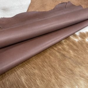 Buffalo lining leather is known for its strength, unique texture, and durability. Tanned with chrome for added toughness and water resistance, this leather is excellent for lining footwear, bags, apparel, and furniture. With an average hide size of 14-16 sq. ft., it's a preferred choice for crafting durable and visually distinct products.