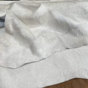 Natural white cowhide with hair-on finish. Perfect for upholstery, décor, handbags, and fashion. Chrome tanned, soft, and durable with a clean, elegant look.
