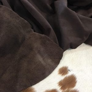 This leather is an ideal choice for lining, footwear, apparel, straps, and accessories. It has a natural grain texture that adds to its unique appearance, and its soft temper makes it easy to work with. The chrome tannage process used to produce this leather ensures that it is durable and long-lasting. In terms of specifications, the Buffalo collection's Nubuck leather is made from raw buffalo hide. It is a side hide, with an average size of 20 square feet. The leather has a thickness of 3 1/2 oz. (1.4 – 1.6 mm), which makes it thick and durable. The leather's natural grain texture adds to its unique appearance, and its soft temper makes it easy to work with.