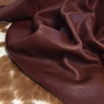 Introducing the Terrace collection VEG Tanned Leather, made from high-quality cowhide with a drum-dyed finish. This versatile style offers a smooth and consistent color that adds elegance and simplicity to any look. The surface of the leather features unique grooves and divots due to the whole-grain hide and its vegetal tannage.