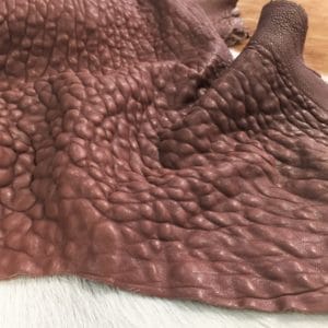 Bubble-shrunken Lambskin is a unique type of soft and cushiony lambskin with a shrunken bubble grain texture that gives it an intriguing and dynamic appearance. Each piece is one-of-a-kind due to the variation in the shrunken effect from one skin to another. The leather is semi-aniline dyed, making it rich and luxurious. It is also durable and flexible, with a thickness of 1.2-1.4 mm. Additionally, it is free from harmful chemicals, making it safe for use and environmentally friendly. If you're looking for high-quality and sustainable leather for apparel, accessories, handbags, or small leather goods, the Bubble Sheep collection is an excellent choice.