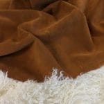 what is cow suede leather? The Vertu Cow Suede Leather Collection is made with exquisite cowhide and suede leather, with a thickness of 1.2-1.6mm and a weight of 3/4 oz. hide size 10-14 sq. ft. Chrome tanning techniques are used for a timeless and classic material, perfect for high-end jackets, boots,belts, and other leather items.