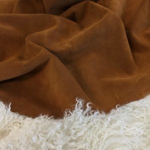 what is cow suede leather? The Vertu Cow Suede Leather Collection is made with exquisite cowhide and suede leather, with a thickness of 1.2-1.6mm and a weight of 3/4 oz. hide size 10-14 sq. ft. Chrome tanning techniques are used for a timeless and classic material, perfect for high-end jackets, boots,belts, and other leather items.