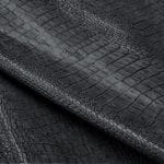 The Alligator leather is a highly attractive and unique type of leather that boasts an exotic style and color tone that is truly mesmerizing. It is a corrected grain leather that is sourced from Europe and has been specially embossed to reproduce the pattern of alligator skin, which gives it a very prominent appearance. The leather's deep texture and rich tone variation are completed by a stucco-finish on the surface, which gives it a smooth surface with a subtle shine.