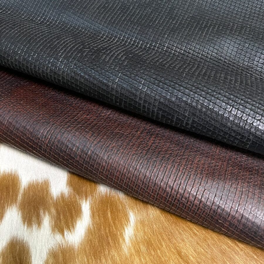 Introducing Alexa Veg Tanned Cow Leather - a special type of leather that is crafted from full grain hide and treated with vegetal tanning. This unique leather boasts a reptile scale-like appearance, but with a more polished and refined look. An aniline finish gives it a waxy, matte texture, while deep grooves outline each square, highlighting their appearance. The squares are also creased, adding texture and definition. The Alexa collection is perfect for various leather needs due to its subtle shine and remarkable design. This leather is made from heifer (double shoulder) and weighs 5/6 oz. (2.2 mm-2.4 mm). It is 100% veg-tanned and dyed through (drum dye). The leather is classified as full-grain with a medium pull-up, has a semi-soft temper, and is sourced from Mexico. The Alexa leather is perfect for crafting straps, handbags, accessories, footwear, belts, and leather crafts.