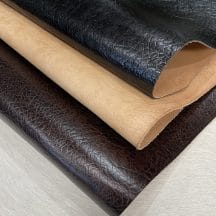 Crafted from premium cowhide, this double shoulder leather features an intricate elephant embossing pattern that adds a bold, exotic texture to any project