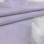 gray lilac suede goat leather avetcoinc@ | Avetco Leather Hides and Eva Foam The Goatskin Suede Leather features a wonderful texture that is eye-catching and feels luxurious to the touch. Its versatility stems from a distinctive tanning method that involves gentle buffing, making it ideal for use in various items such as clothing, moccasins, lining, handbags, shoes, and accessories. Those who value timeless elegance and quality will undoubtedly find this leather worth the investment, as it guarantees utmost quality and worth through full hide pieces that typically range in size between 2-4 square feet and have a thickness of 3 oz (1.0-1.1mm). What is Goat Suede? Goat suede undergoes an extra finishing process that creates a velvety texture. This process involves buffing the flesh side of the hide, resulting in a soft and textured nap that feels wonderful to the touch.