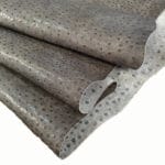 Gray Alba | Avetco Leather Hides and Eva Foam Ostrich Embossed Cow Leather is made of European leather with a unique embossed grain texture that resembles Ostrich skin. Its rough appearance, complete with grooves and bumps, makes it beautiful and durable. The leather has a waxed finish that adds smoothness and shine to its surface. This collection uses chrome tanning, which gives it a luxurious and rich look.