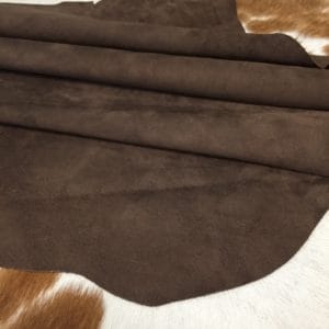 What is nubuck leather This material is suitable for footwear, accessories, handbags, apparel, craft, belts, and DIY projects. Nubuck leather is swine (pig leather) that has a medium soft temper and a chrome tannage. It has a texture that is referred to as nubuck and an average hide size of 5-6 sq. ft. The thickness is 3 oz. (1.0 – 1.2 mm). The raw material comes from the subspecies Sus scrofa domesticus and is from Taiwan. It can be used for DIY projects.