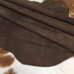 What is nubuck leather This material is suitable for footwear, accessories, handbags, apparel, craft, belts, and DIY projects. Nubuck leather is swine (pig leather) that has a medium soft temper and a chrome tannage. It has a texture that is referred to as nubuck and an average hide size of 8-10 sq. ft. The thickness is 3 oz. (1.0 – 1.2 mm). The raw material comes from the subspecies Sus scrofa domesticus and is from Taiwan. It can be used for DIY projects.