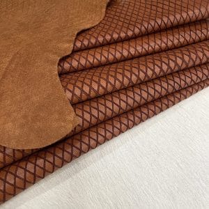 Premium grain leather with a laser-cut diamond pattern, designed for both elegance and durability. This leather features a wax finish, enhancing its texture and depth, making it an excellent choice for upholstery, accessories, footwear, and high-end fashion applications.