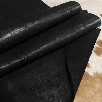 The Y. Bolt Cow Suede Collection is a range of leather products that have a unique and rustic appearance due to a combination of special waxes applied on the surface. The leather is tanned using a specific process that involves hot wax application, resulting in a vintage and hip look. The Bolt collection has a subtly shiny and rigid texture that provides a consistent color and design across the surface, making it a durable and attractive leather option for footwear, accessories, handbags, wallets, belts, and more. The raw material used for this collection is cowhide, and the leather is made of cow suede and wax. It has a semi-soft leather temper and a thickness of 1.4-1.6mm, with a weight of 3/4 oz. The average hide size is 17-19 sq. ft., and the tanning process used is chrome tanning. The leather is sourced from Turkey, and it is free of PCP, Azo Pigments, Chrome VI, Formaldehyde, and APEO, ensuring a safe and high-quality product.