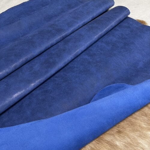 The Y. Bolt Cow Suede Collection is a range of leather products that have a unique and rustic appearance due to a combination of special waxes applied on the surface. The leather is tanned using a specific process that involves hot wax application, resulting in a vintage and hip look. The Bolt collection has a subtly shiny and rigid texture that provides a consistent color and design across the surface, making it a durable and attractive leather option for footwear, accessories, handbags, wallets, belts, and more. The raw material used for this collection is cowhide, and the leather is made of cow suede and wax. It has a semi-soft leather temper and a thickness of 1.4-1.6mm, with a weight of 3/4 oz. The average hide size is 17-19 sq. ft., and the tanning process used is chrome tanning. The leather is sourced from Turkey, and it is free of PCP, Azo Pigments, Chrome VI, Formaldehyde, and APEO, ensuring a safe and high-quality product.