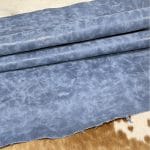 The Y. Bolt Cow Suede Collection is a range of leather products that have a unique and rustic appearance due to a combination of special waxes applied on the surface. The leather is tanned using a specific process that involves hot wax application, resulting in a vintage and hip look. The Bolt collection has a subtly shiny and rigid texture that provides a consistent color and design across the surface, making it a durable and attractive leather option for footwear, accessories, handbags, wallets, belts, and more. The raw material used for this collection is cowhide, and the leather is made of cow suede and wax. It has a semi-soft leather temper and a thickness of 1.4-1.6mm, with a weight of 3/4 oz. The average hide size is 17-19 sq. ft., and the tanning process used is chrome tanning. The leather is sourced from Turkey, and it is free of PCP, Azo Pigments, Chrome VI, Formaldehyde, and APEO, ensuring a safe and high-quality product.