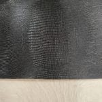 Lizard Black | Avetco Leather Hides and Eva Foam Lizard Embossed Cowhide is a vegetable-tanned leather with a bold, exotic texture. At 3 oz thick and medium temper, it’s ideal for bags, belts, wallets, and costume work. This high-quality cowhide is tanned in Mexico and embossed with a sharp, consistent lizard pattern.