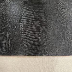 Lizard Embossed Cowhide is a vegetable-tanned leather with a bold, exotic texture. At 3 oz thick and medium temper, it’s ideal for bags, belts, wallets, and costume work. This high-quality cowhide is tanned in Mexico and embossed with a sharp, consistent lizard pattern.