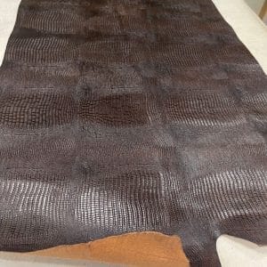 Lizard Embossed Cowhide is a vegetable-tanned leather with a bold, exotic texture. At 3 oz thick and medium temper, it’s ideal for bags, belts, wallets, and costume work. This high-quality cowhide is tanned in Mexico and embossed with a sharp, consistent lizard pattern.
