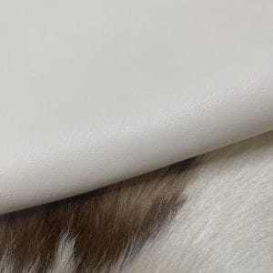 The Milano Cow Leather Collection is made of full-grain European leather produced from whole hides. This gives the leather a soft and luxurious finish on the surface, resulting in a subtle yet rich appearance. The collection is available in 48 complementary colors and is lightly pigmented and flexible, making it an excellent option for cutting. The Milano Collection is unbuffed and chrome-tanned, giving these leathers a smooth and elegant look.