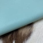 The Milano Cow Leather Collection is made of full-grain European leather produced from whole hides. This gives the leather a soft and luxurious finish on the surface, resulting in a subtle yet rich appearance. The collection is available in 48 complementary colors and is lightly pigmented and flexible, making it an excellent option for cutting. The Milano Collection is unbuffed and chrome-tanned, giving these leathers a smooth and elegant look.