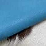 The Milano Cow Leather Collection is made of full-grain European leather produced from whole hides. This gives the leather a soft and luxurious finish on the surface, resulting in a subtle yet rich appearance. The collection is available in 48 complementary colors and is lightly pigmented and flexible, making it an excellent option for cutting. The Milano Collection is unbuffed and chrome-tanned, giving these leathers a smooth and elegant look.